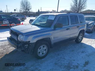 2014 Jeep Patriot Sport with VIN 1C4NJPBB2ED915782, listed as a IAAI auction lot 41628774 with 144,588 mi miles. Bid and sale history available at carsss.com. Image 2.