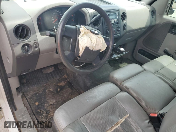 2007 Ford F-150 XL with VIN 1FTRF12W97KC13119, listed as a Copart auction lot 60927195 with 208,316 mi miles and Salvage title. Bid and sale history available at DreamBid. Image 8.