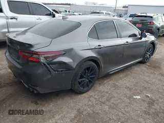 2021 Toyota Camry SE Nightshade with VIN 4T1T11AK3MU496499, listed as a IAAI auction lot 41733005 with 141,711 mi miles. Bid and sale history available at carsss.com. Image 4.
