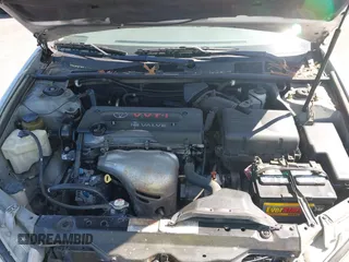 2004 Toyota Camry LE with VIN 4T1BE32K04U319290, listed as a IAAI auction lot 42019125 with 304,666 mi miles. Bid and sale history available at carsss.com. Image 10.