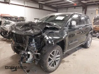 2021 Jeep Grand Cherokee 80th Anniversary with VIN 1C4RJFBG5MC732694, listed as a IAAI auction lot 41410124 with 84,958 mi miles and . Bid and sale history available at DreamBid. Image 18.