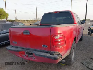 2001 Ford F-150 XLT with VIN 1FTRW07W61KF51667, listed as a IAAI auction lot 41846904 with 187,076 mi miles and . Bid and sale history available at DreamBid. Image 4.