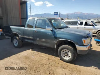 1995 Toyota T100 z VIN JT4VD22F4S0006698, wystawiony jako Copart lot #76022924 z przebiegiem 457 624 mil mil oraz Tytuł czysty. Historia ofert i sprzedaży dostępna na DreamBid. Obrazek 4.