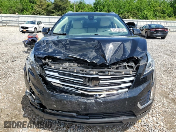 2017 Cadillac XT5 Luxury FWD с VIN 1GYKNBRS0HZ150007, выставлен на аукционе Copart как лот 54745505 с пробегом 37 271 миль миль и Списание • Salvage title. История ставок и продаж доступна на DreamBid. Изображение 5.