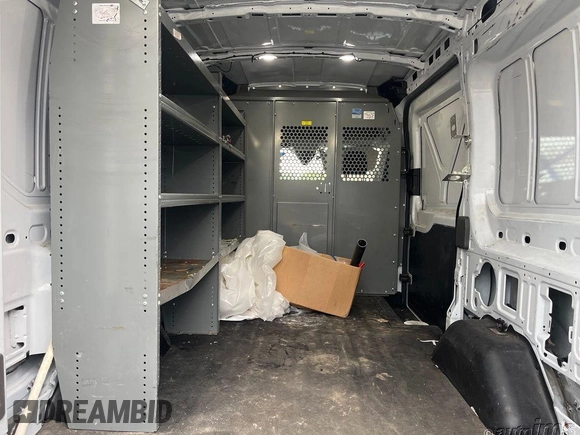 2020 Ford Transit Cargo with VIN 1FTYE1C86LKB62039, listed as a IAAI auction lot 42599731 with 102,656 mi miles and . Bid and sale history available at DreamBid. Image 4.
