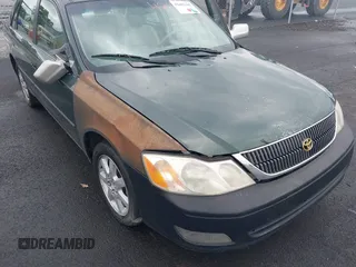 2000 Toyota Avalon XL z VIN 4T1BF28B6YU036865, wystawiony jako IAAI lot #42402305 z przebiegiem 202 265 mil mil oraz . Historia ofert i sprzedaży dostępna na DreamBid. Obrazek 6.