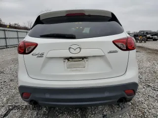 2014 Mazda CX-5 Grand Touring with VIN JM3KE4DY8E0301258, listed as a Copart auction lot 84248134 with 130,599 mi miles and Clean Title. Bid and sale history available at carsss.com. Image 6.