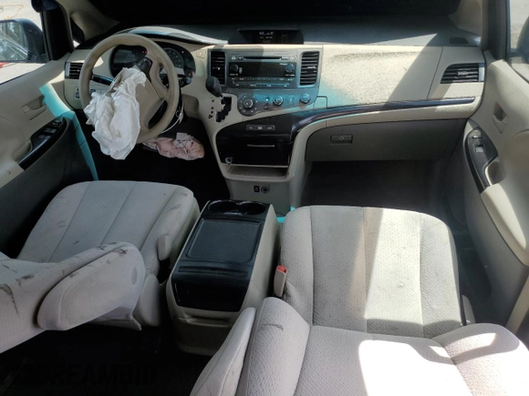 2012 Toyota Sienna LE AAS с VIN 5TDKK3DC4CS218114, выставлен на аукционе Copart как лот 56473025 с пробегом 214 865 миль миль и Списание • Salvage title. История ставок и продаж доступна на DreamBid. Изображение 8.