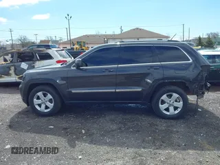 2011 Jeep Grand Cherokee Laredo with VIN 1J4RR4GG9BC723395, listed as a IAAI auction lot 42092022 with 86,226 mi miles and . Bid and sale history available at DreamBid. Image 14.