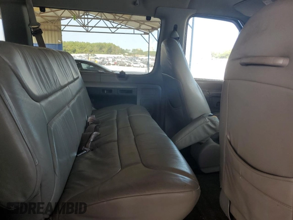 1998 Ford Econoline Wagon XL z VIN 1FBSS31S7WHB00261, wystawiony jako Copart lot #71019534 z przebiegiem 230 030 mil mil oraz Szkody całkowita. Historia ofert i sprzedaży dostępna na DreamBid. Obrazek 11.