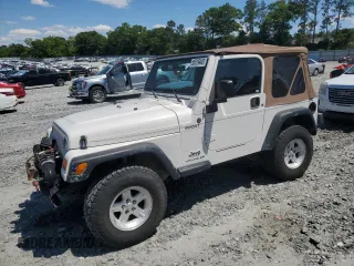 2004 Jeep Wrangler Sport with VIN 1J4FA49S94P751849, listed as a Copart auction lot 55519445 with 139,854 mi miles and Salvage title. Bid and sale history available at DreamBid. Image 1.