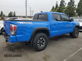 2021 Toyota Tacoma SR with VIN 3TMCZ5AN1MM426566, listed as a Copart auction lot 59613315 with 28,903 mi miles and Salvage title. Bid and sale history available at DreamBid. Image 3.