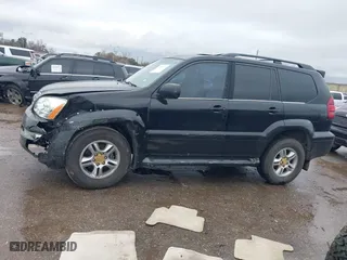 2005 Lexus GX 470 with VIN JTJBT20X150084634, listed as a IAAI auction lot 41461071 with 180,387 mi miles. Bid and sale history available at carsss.com. Image 14.
