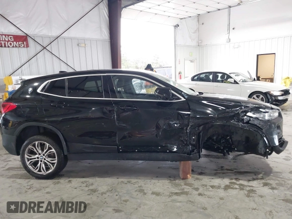 2020 BMW X2 xDrive28i z VIN WBXYJ1C08L5P45302, wystawiony jako IAAI lot #41788245 z przebiegiem 57 000 mil mil oraz . Historia ofert i sprzedaży dostępna na DreamBid. Obrazek 14.
