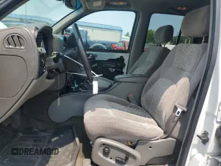2003 GMC Envoy SLE z VIN 1GKDT13S732228585, wystawiony jako Copart lot #58764565 z przebiegiem 151 107 mil mil oraz Szkoda całkowita • Salvage title. Historia ofert i sprzedaży dostępna na DreamBid. Obrazek 7.