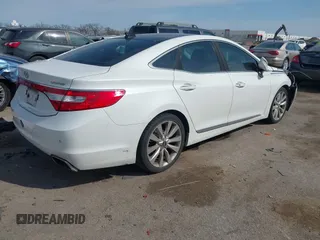 2015 Hyundai Azera Limited with VIN KMHFH4JG7FA476458, listed as a IAAI auction lot 41893979 with 149,114 mi miles and . Bid and sale history available at DreamBid. Image 4.