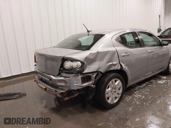 2014 Dodge Avenger SE with VIN 1C3CDZAB4EN148429, listed as a IAAI auction lot 41687320 with 149,084 mi miles and . Bid and sale history available at DreamBid. Image 6.