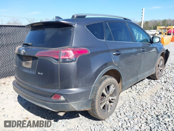 2018 Toyota RAV4 XLE with VIN 2T3WFREV2JW450019, listed as a IAAI auction lot 41704084 with 257,737 mi miles. Bid and sale history available at carsss.com. Image 4.