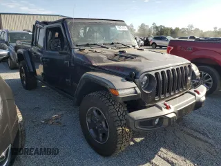 2023 Jeep Gladiator Rubicon с VIN 1C6JJTBGXPL574702, выставлен на аукционе Copart как лот 75914474 с пробегом 10 506 миль миль и Списание • Salvage title. История ставок и продаж доступна на DreamBid. Изображение 4.
