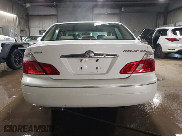 2003 Toyota Avalon XL with VIN 4T1BF28B73U330445, listed as a Copart auction lot 49662095 with 106,597 mi miles and Salvage Title. Bid and sale history available at carsss.com. Image 6.