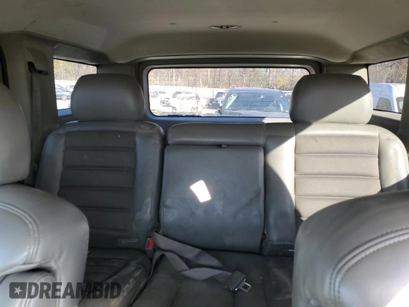 2003 Hummer H2 with VIN 5GRGN23U13H141352, listed as a Copart auction lot 77896844 with 147,723 mi miles and Clean Title. Bid and sale history available at carsss.com. Image 10.
