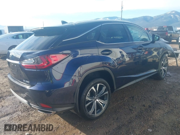 2022 Lexus RX 350 with VIN 2T2HZMDA9NC344583, listed as a IAAI auction lot 41878741 with 27,946 mi miles and . Bid and sale history available at DreamBid. Image 4.