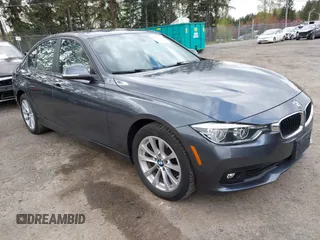 2018 BMW 3 Series 320i xDrive with VIN WBA8E5G53JNV03333, listed as a IAAI auction lot 42018275 with 45,950 mi miles. Bid and sale history available at carsss.com. Image 1.