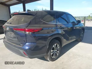 2023 Toyota Highlander L with VIN 5TDKDRAH3PS526958, listed as a IAAI auction lot 42397325 with 10,430 mi miles and . Bid and sale history available at DreamBid. Image 4.