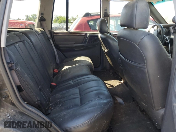 1998 Jeep Grand Cherokee Laredo with VIN 1J4GZ58Y4WC109610, listed as a Copart auction lot 58705124 with 247,990 mi miles and Salvage Title. Bid and sale history available at carsss.com. Image 10.
