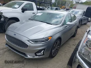 2020 Ford Fusion Titanium с VIN 3FA6P0K91LR128016, выставлен на аукционе IAAI как лот 41947905 с пробегом 79 622 миль миль и . История ставок и продаж доступна на DreamBid. Изображение 17.