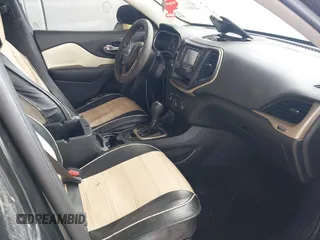 2015 Jeep Cherokee Sport with VIN 1C4PJLAB2FW539397, listed as a IAAI auction lot 42156576 with 120,409 mi miles. Bid and sale history available at carsss.com. Image 5.