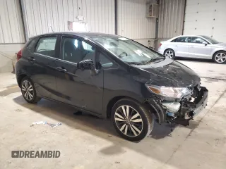 2015 Honda Fit EX with VIN 3HGGK5G86FM725059, listed as a Copart auction lot 55472275 with 63,096 mi miles and Salvage title. Bid and sale history available at DreamBid. Image 4.