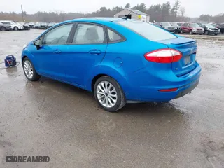 2014 Ford Fiesta SE with VIN 3FADP4BJ6EM204449, listed as a IAAI auction lot 41992813 with 92,026 mi miles. Bid and sale history available at carsss.com. Image 3.
