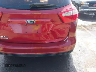 2013 Ford C-Max SEL z VIN 1FADP5CU4DL555035, wystawiony jako IAAI lot #42355498 z przebiegiem 172 374 mil mil oraz . Historia ofert i sprzedaży dostępna na DreamBid. Obrazek 6.