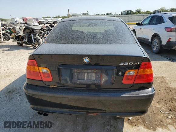 2005 BMW 3 Series 330xi with VIN WBAEW53455PN39175, listed as a Copart auction lot 75733054 with 165,015 mi miles and Salvage Title. Bid and sale history available at DreamBid. Image 6.