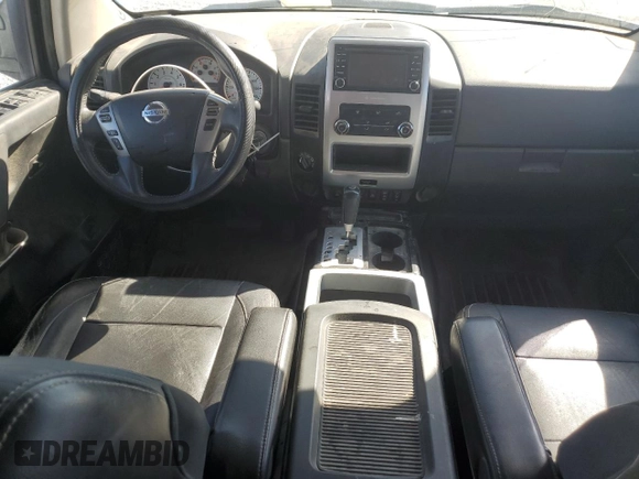 2014 Nissan Titan S with VIN 1N6AA0EC1EN510658, listed as a Copart auction lot 75210054 with Not Provided miles and Salvage Title. Bid and sale history available at DreamBid. Image 8.