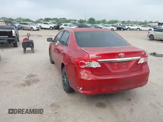 2011 Toyota Corolla L with VIN 2T1BU4EE2BC601203, listed as a IAAI auction lot 41913651 with 180,942 mi miles. Bid and sale history available at carsss.com. Image 3.