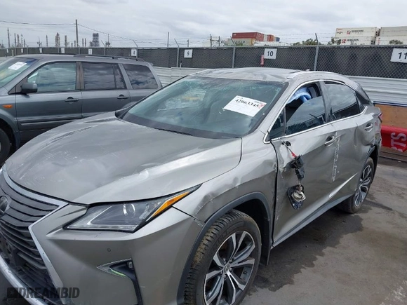 2017 Lexus RX with VIN 2T2ZZMCA8HC066740, listed as a IAAI auction lot 42063345 with 54,673 mi miles. Bid and sale history available at carsss.com. Image 6.