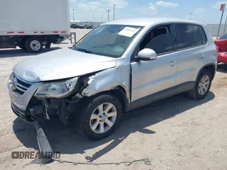 2010 Volkswagen Tiguan S with VIN WVGAV7AX5AW002380, listed as a IAAI auction lot 42604662 with 124,841 mi miles and . Bid and sale history available at DreamBid. Image 2.