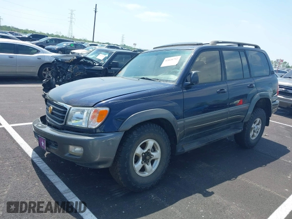2000 Toyota Land Cruiser with VIN JT3HT05J8Y0123024, listed as a IAAI auction lot 42028792 with 360,074 mi miles. Bid and sale history available at carsss.com. Image 2.