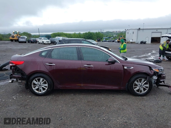 2016 Kia Optima LX with VIN 5XXGT4L31GG053429, listed as a IAAI auction lot 42464513 with 122,397 mi miles and . Bid and sale history available at DreamBid. Image 14.