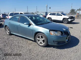 2009 Pontiac G6 1SB with VIN 1G2ZJ57K894245972, listed as a IAAI auction lot 42460545 with 163,958 mi miles and . Bid and sale history available at DreamBid. Image 1.