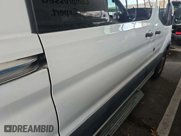 2016 Ford Transit Cargo z VIN 1FTYE1YM9GKB18600, wystawiony jako IAAI lot #42726792 z przebiegiem 127 434 mil mil oraz . Historia ofert i sprzedaży dostępna na DreamBid. Obrazek 16.