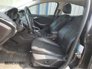 2014 Ford Focus Titanium with VIN 1FADP3J20EL347435, listed as a Copart auction lot 54947345 with 144,169 mi miles and Salvage title. Bid and sale history available at DreamBid. Image 7.