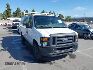 2013 Ford Econoline Cargo Commercial with VIN 1FTNE1EW7DDA98789, listed as a IAAI auction lot 42382594 with 251,602 mi miles and . Bid and sale history available at DreamBid. Image 6.