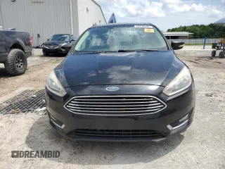 2015 Ford Focus Titanium with VIN 1FADP3J28FL362590, listed as a Copart auction lot 59759495 with 58,644 mi miles and Clean title. Bid and sale history available at DreamBid. Image 5.