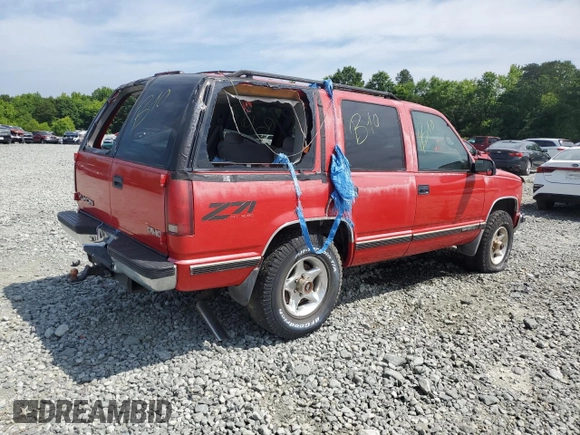 1999 GMC Yukon with VIN 1GKEK13R5XJ700234, listed as a Copart auction lot 55885584 with 163,129 mi miles and Salvage Title. Bid and sale history available at carsss.com. Image 3.