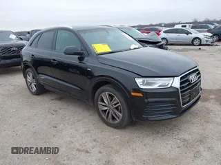 2018 Audi Q3 Premium with VIN WA1ECCFS3JR011475, listed as a IAAI auction lot 41442337 with 96,839 mi miles. Bid and sale history available at carsss.com. Image 1.