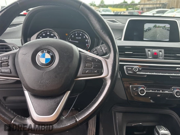 2018 BMW X1 sDrive28i with VIN WBXHU7C38J5L08773, listed as a Copart auction lot 55470955 with 149,885 mi miles and Clean Title. Bid and sale history available at DreamBid. Image 9.