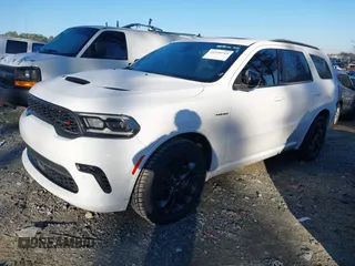 2023 Dodge Durango R/T Plus z VIN 1C4SDHCTXPC567522, wystawiony jako IAAI lot #41339712 z przebiegiem 55 386 mil mil oraz . Historia ofert i sprzedaży dostępna na DreamBid. Obrazek 14.